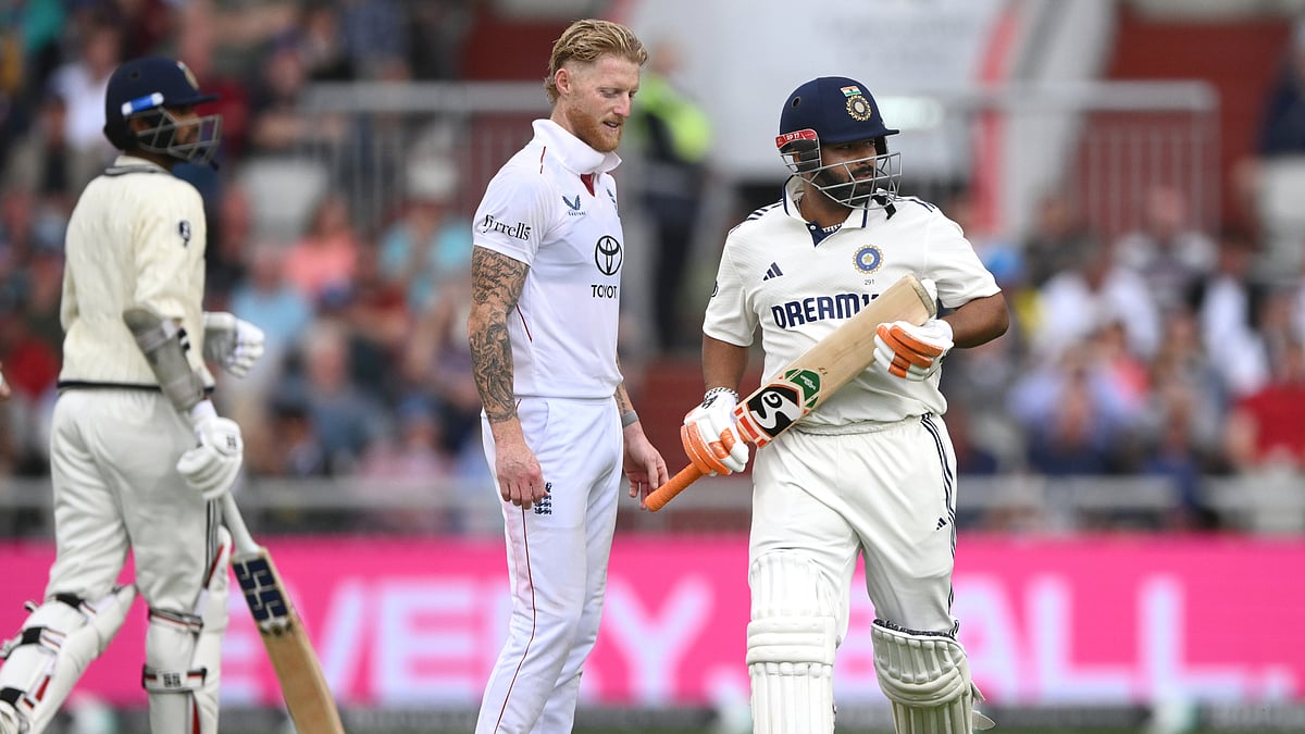 Ben Stokes looks on as Rishabh Pant hobbles to the crease.