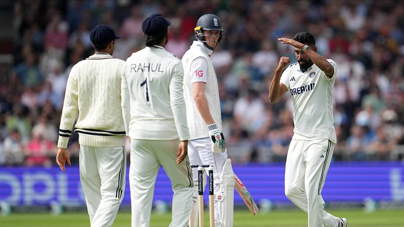 Indias Mohammed Siraj, right, call for third umpires review. AP