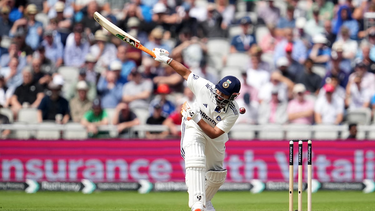 AP Photo/Jon Super : India's Rishabh Pant plays a shot during the second day of the fourth cricket test match between England and India at Emirates Old Trafford, Manchester.