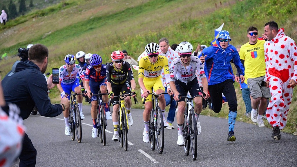 (Bernard Papon/Pool Photo via AP) : Britain's Adam Yates, Slovenia's Tadej Pogacar, wearing the overall leader's yellow jersey, Denmark's Jonas Vingegaard, Britain's Oscar Onley, and Slovenia's Primoz Roglic, climb during the eighteenth stage of the Tour de France cycling race over 171.5 kilometers (106.6 miles) with start in Vif and finish in Courchevel Col de la Loze, France, Thursday, July 24, 2025. 
