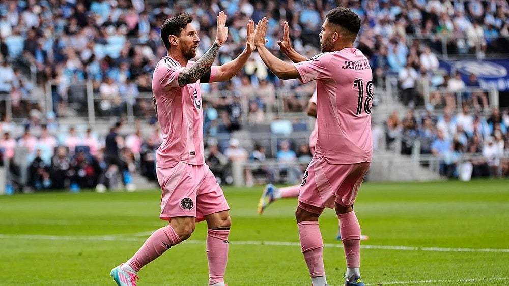 | Photo: AP/Abbie Parr : MLS: Inter Miami players Lionel Messi and Jordi Alba celebrate a goal. 