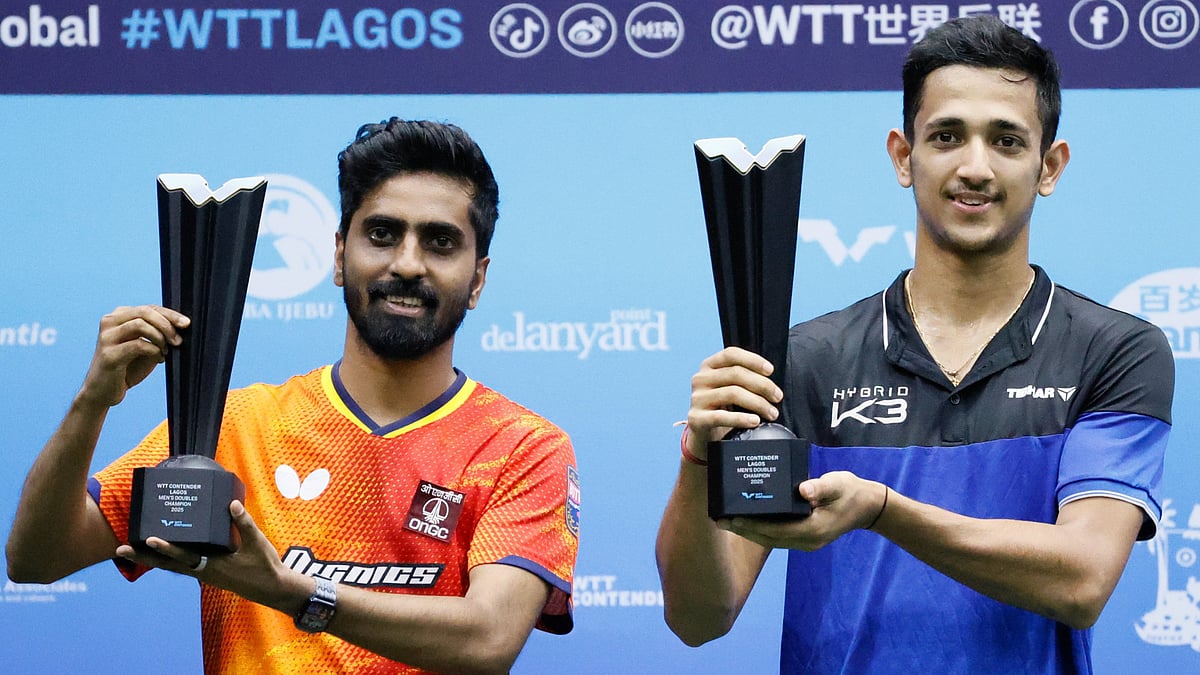 | Photo: X/WTTGlobal : Sathiyan Gnanasekaran and Akash Pal with the WTT Contender Lagos 2025 men's doubles title.
