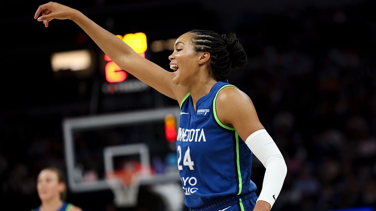 WNBA superstar Napheesa Collier of the Minnesota Lynx reacts after attempting a shot.