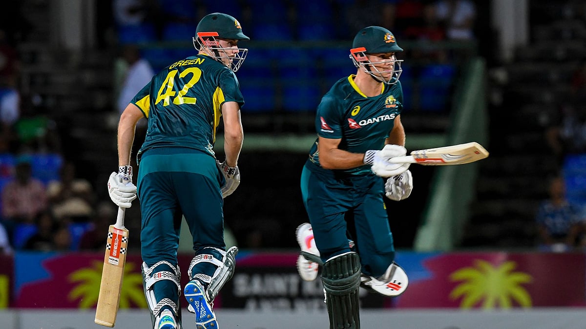 Green (left) guided Australia to a fourth straight win