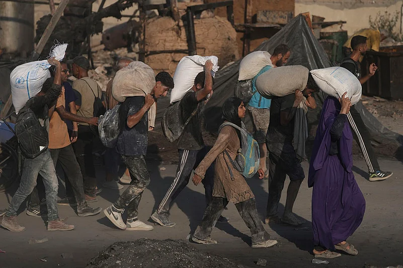 Israel Palestinians: Humanitarian Aid Is Airdropped Into Gaza_4