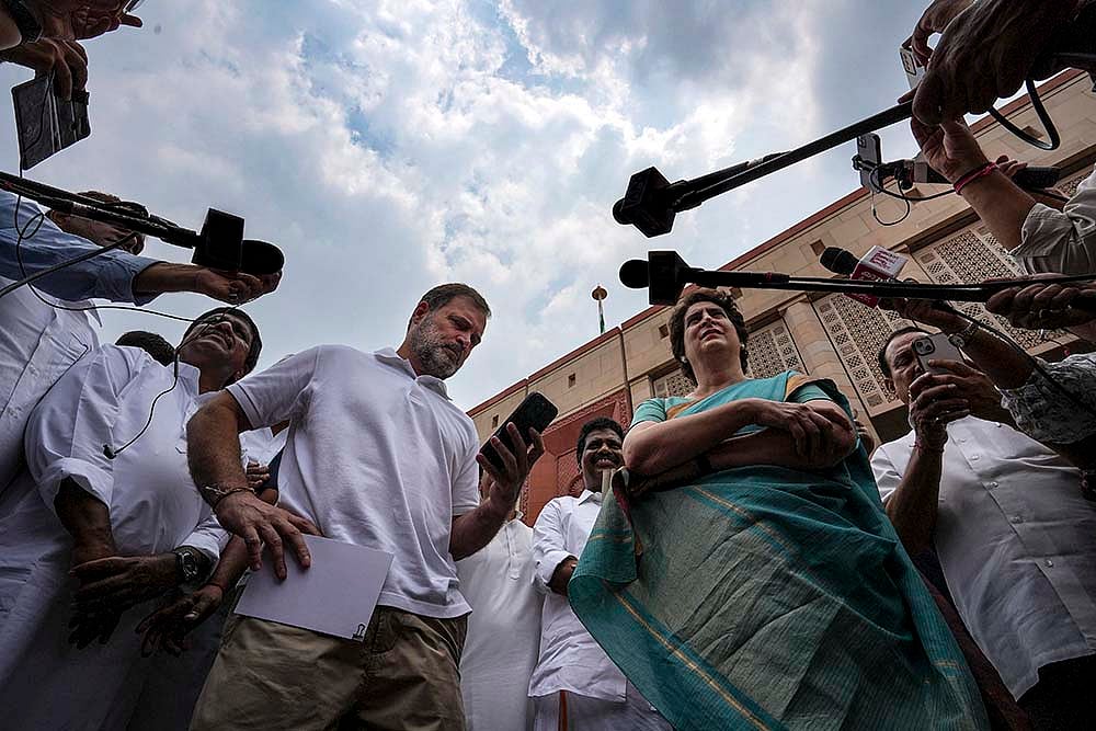 | Photo: PTI/Arun Sharma : Rahul Gandhi with Priyanka during Monsoon session of Parliament