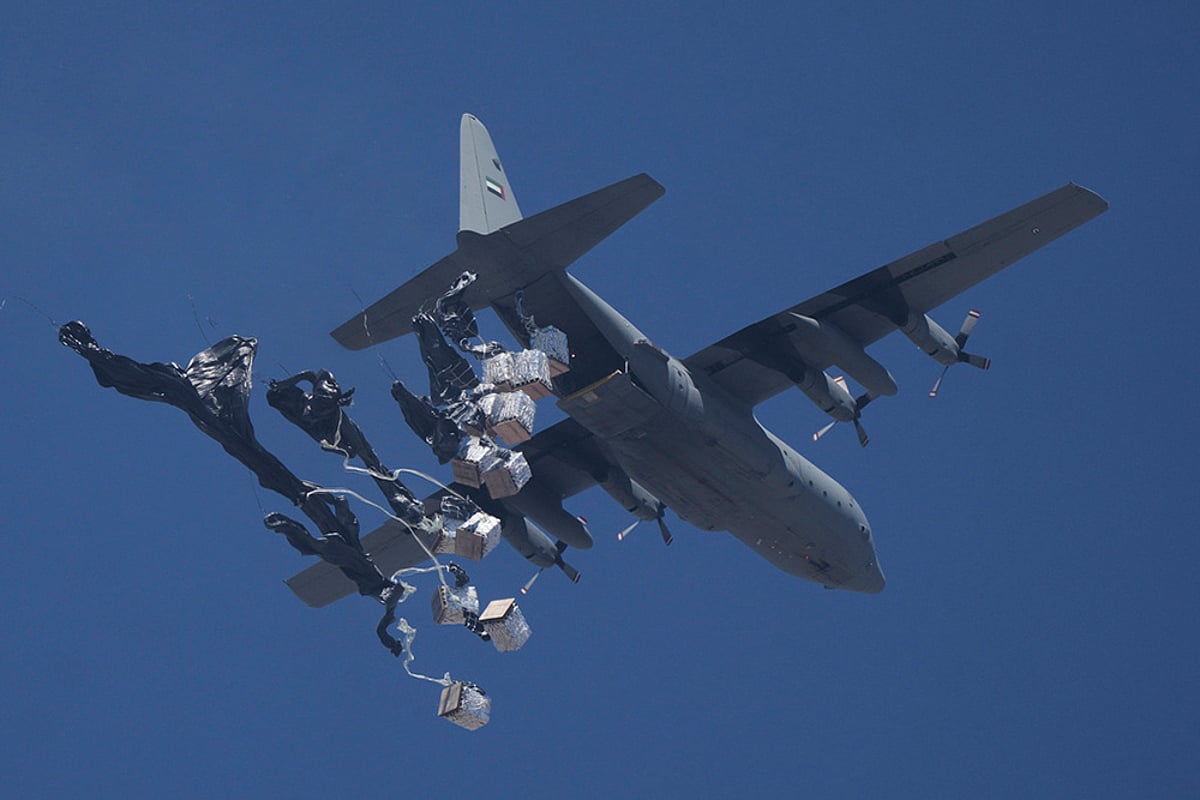 Israel Palestinians: Humanitarian Aid Is Airdropped Into Gaza_1