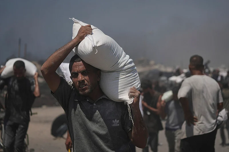 Israel Palestinians: Humanitarian Aid Is Airdropped Into Gaza_3