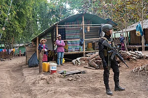 Photo by Thierry Falise/LightRocket via Getty Images : KAYAH KARENNI STATE, MYANMAR. February 24, 2025: A soldier from an armed group fighting the Burmese army who took power in a coup in February 2021, stands in a camp for internally displaced people.