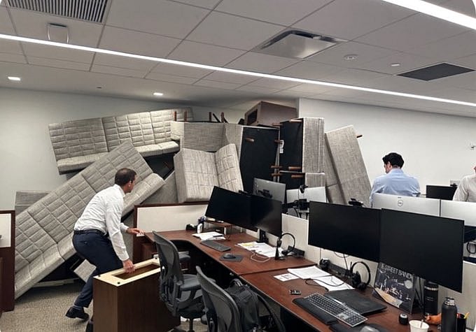 X.com : Image captured inside the Manhattan office building where the shooting took place.