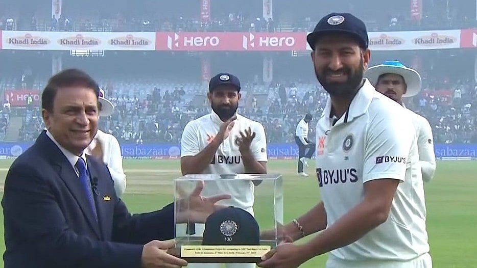 BCCI : Sunil Gavaskar presenting a special cap to Pujara during the latter's 100th Test match.