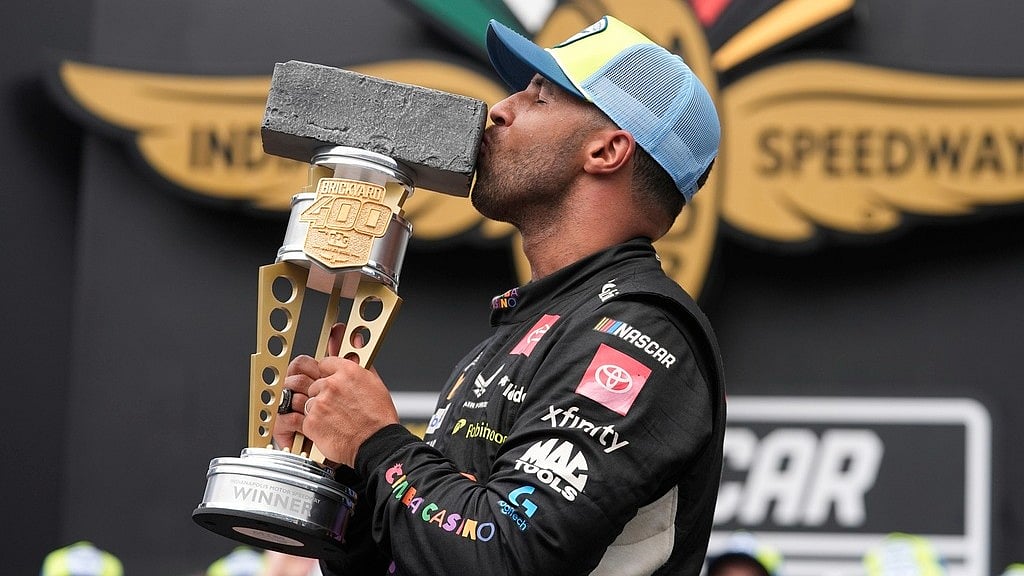AP : Bubba Wallace celebrates after winning a NASCAR Cup Series auto race at Indianapolis Motor Speedway, Sunday, July 27, 2025, in Indianapolis.