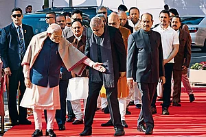 | Photo: Getty Images : Mysterious Exit: Prime Minister Narendra Modi with Jagdeep Dhankhar in Parliament on December 13, 2024