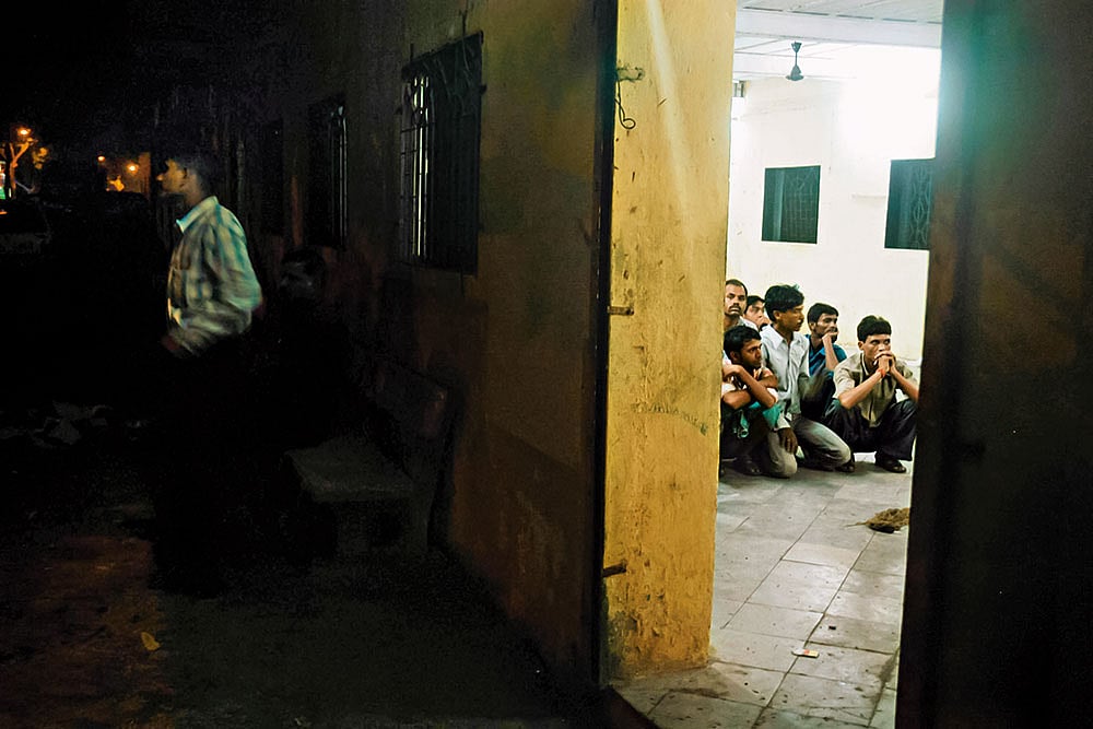 | File Photo : Unlimited Trauma: Mumbai train blast suspects rounded up for interrogation at a police station