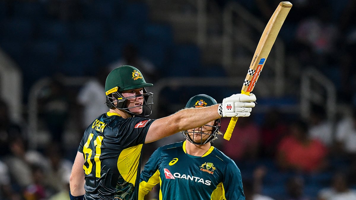 Mitchell Owen celebrates after making a half-century against West Indies.