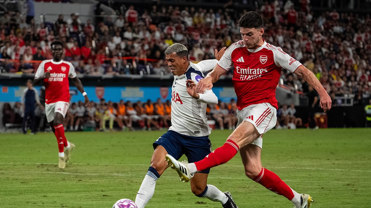Arsenals Declan Rice, right, takes a shot during the first North London Derby. AP