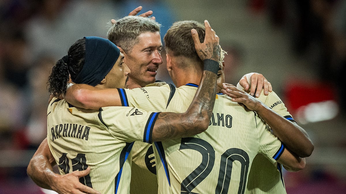 | Photo: X/FCBarcelona : FC Seoul vs Barcelona Live Score: Robert Lewandowski celebrates with his teammates after scoring the first goal.