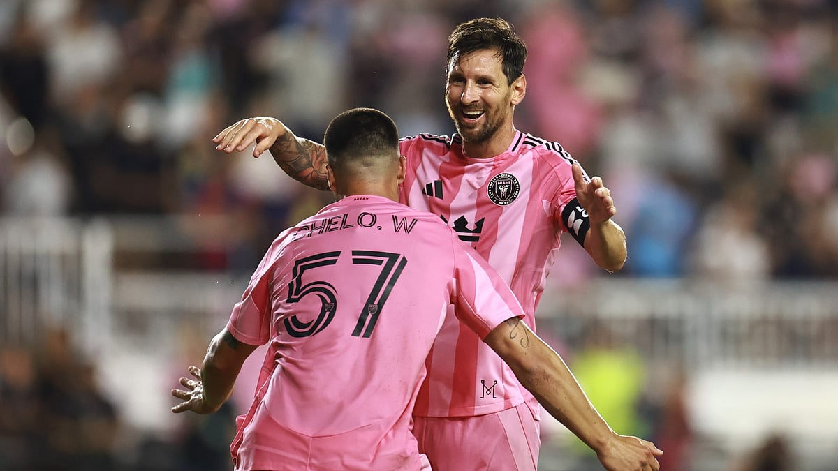 Marcelo Weigandt and Lionel Messi celebrate Inter Miami's late winner