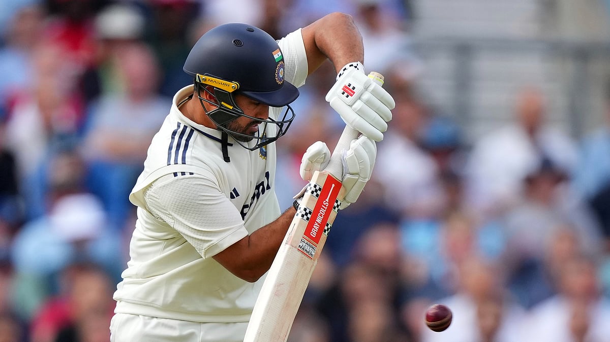 AP Photo/Kirsty Wigglesworth : India's Karun Nair plays a shot during the first day of the fifth cricket test match between England and India at The Kia Oval in London.