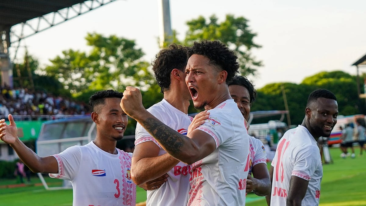 | Photo: Durand Cup : Bodoland FC vs Karbi Anglong Morning Star, Durand Cup 2025: Gwgwmsar Gayary celebrates with his teammates after scoring his side's first goal in the Group D fixture.