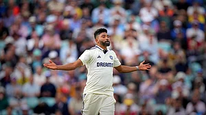 AP/Kirsty Wigglesworth : India's Mohammed Siraj celebrates the dismissal of England's Harry Brook during the second day of the fifth Test