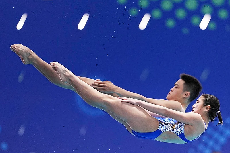 Best Swimming and Diving photos from World Aquatics Championships 2025_Xie Peiling and Zhu Yongxin