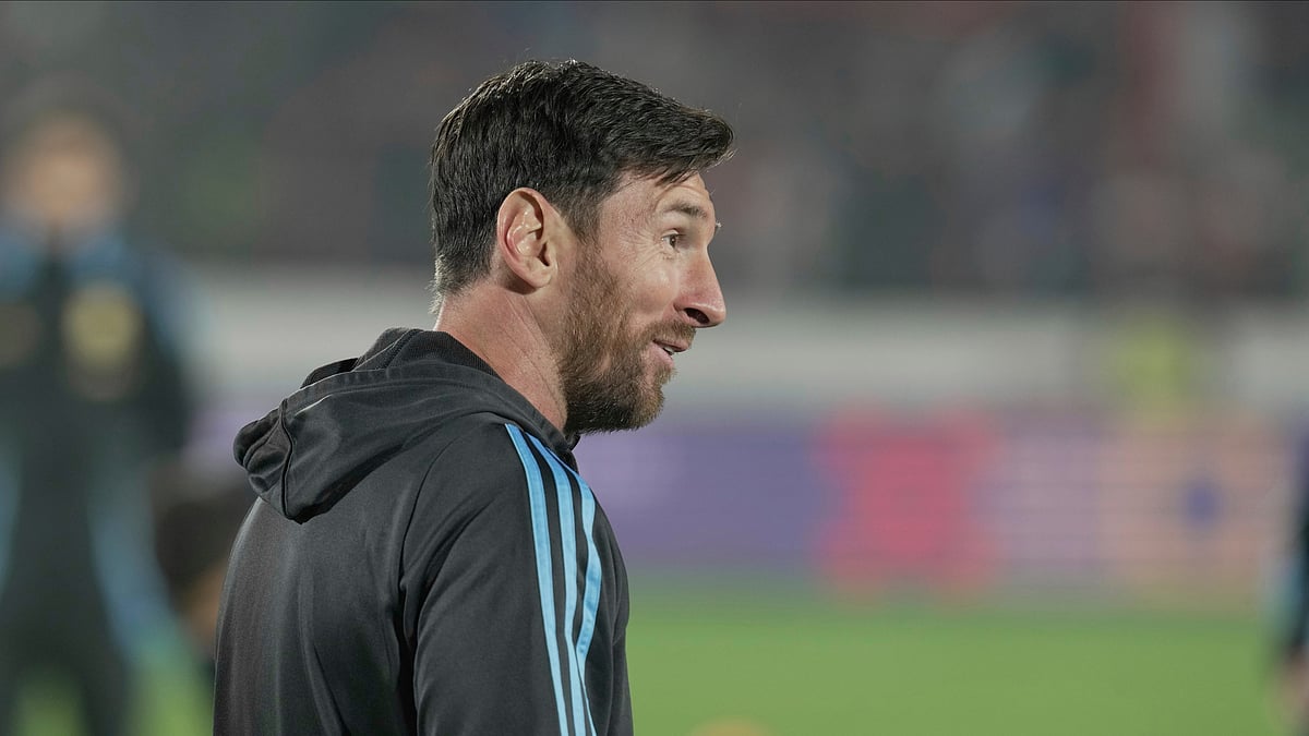 AP Photo/Luis Hidalgo : Argentina's Lionel Messi warms up prior to a qualifying football match.
