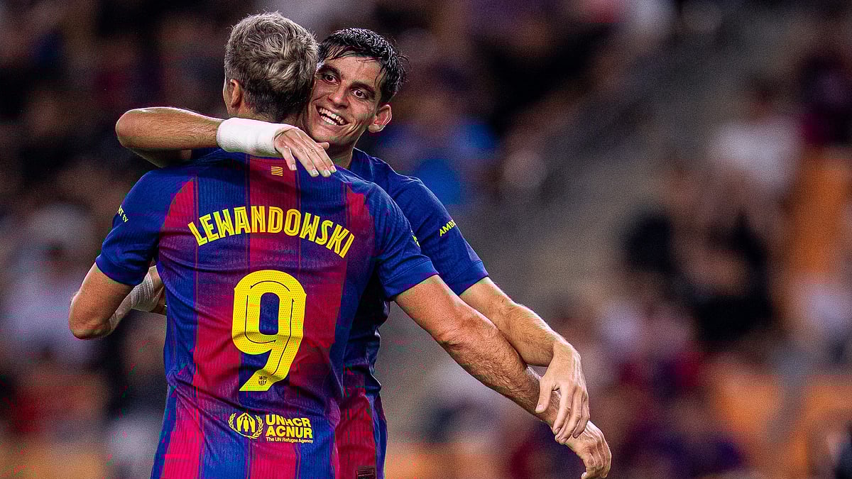 | Photo: X/FCBarcelona : Daegu FC vs Barcelona: Robert Lewandowski celebrates with Gerard Martin after scoring in the pre-season friendly match.