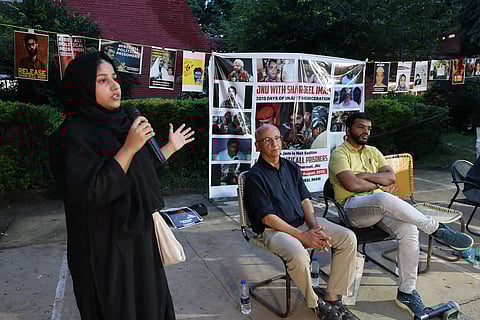 From left Afreen Fatima speaking at the event, Harsh Mander and Abdul Wahid Shaikh. 