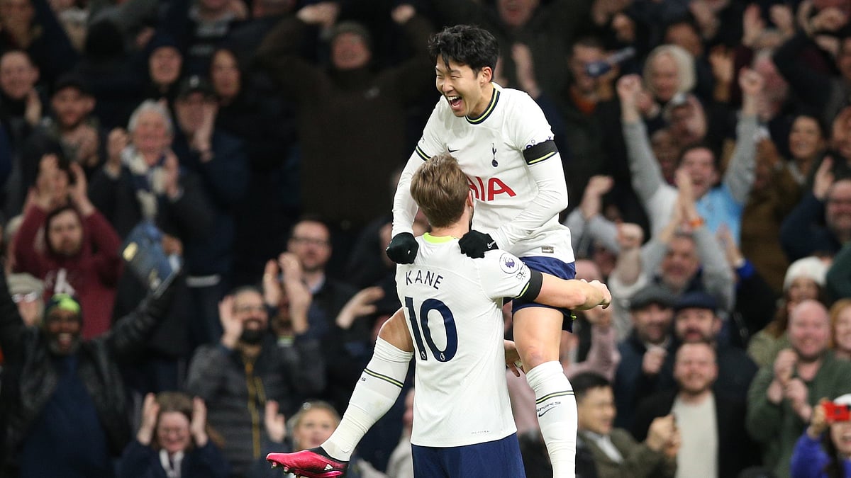 Harry Kane and Heung-min Son celebrate for Tottenham.