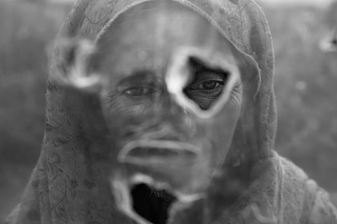 Rafeeqa lives with her only son who was just a year old when her husband went missing. Her husband was a labourer and had gone out for work and never returned. Rafeeqa never remarried, she raised her son on her own. “My father going missing has taken a heavy toll on my mother’s mental health and physical health lately”, says Rafeeqa’s son. | Yasir Iqbal