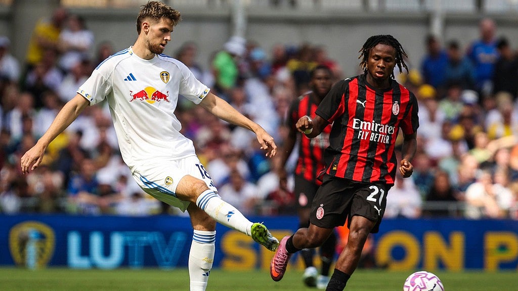Evan Treacy/PA via AP : Leeds United's Anton Stach, left, and AC Milan's Samuel Chukwueze in action during the pre-season friendly soccer match between Leeds United and AC Milan at Aviva Stadium in Dublin.