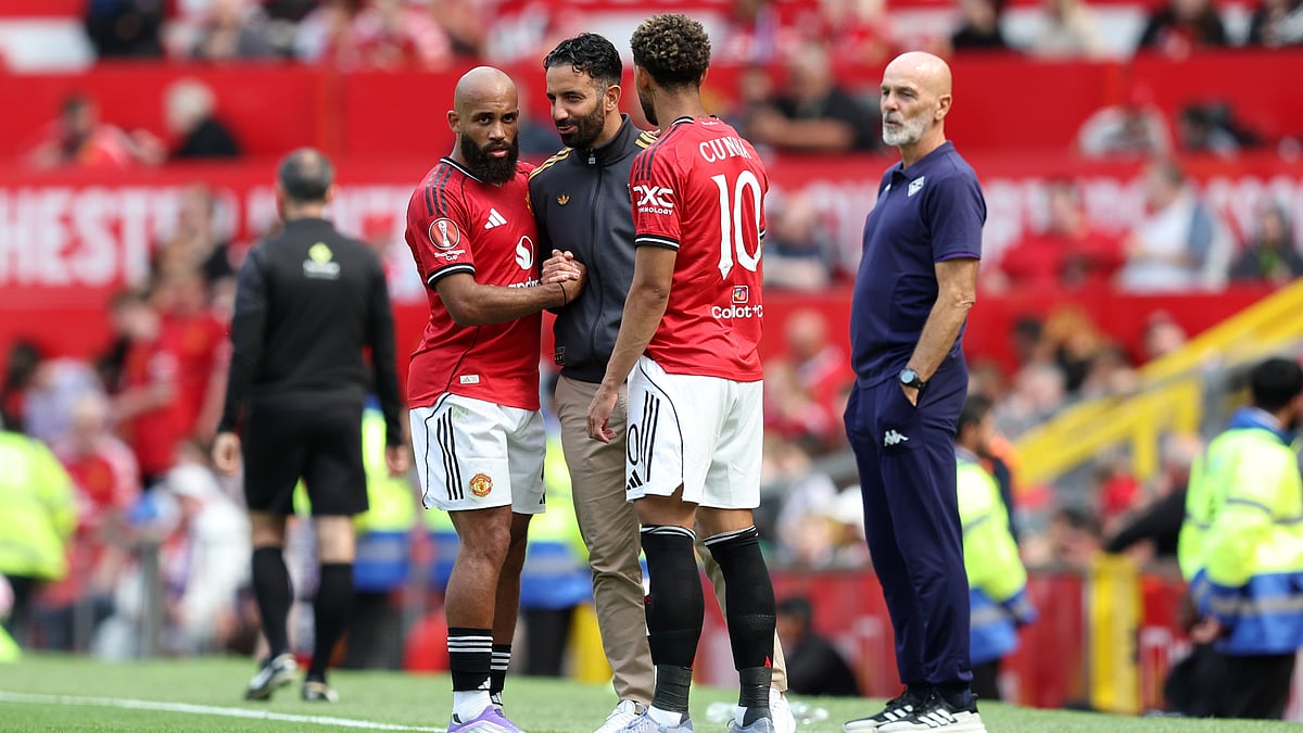 Ruben Amorim pictured with new signings Bryan Mbeumo and Matheus Cunha.