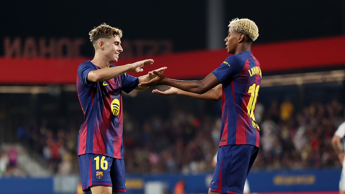 Barcelona's Fermin Lopez and Lamine Yamal