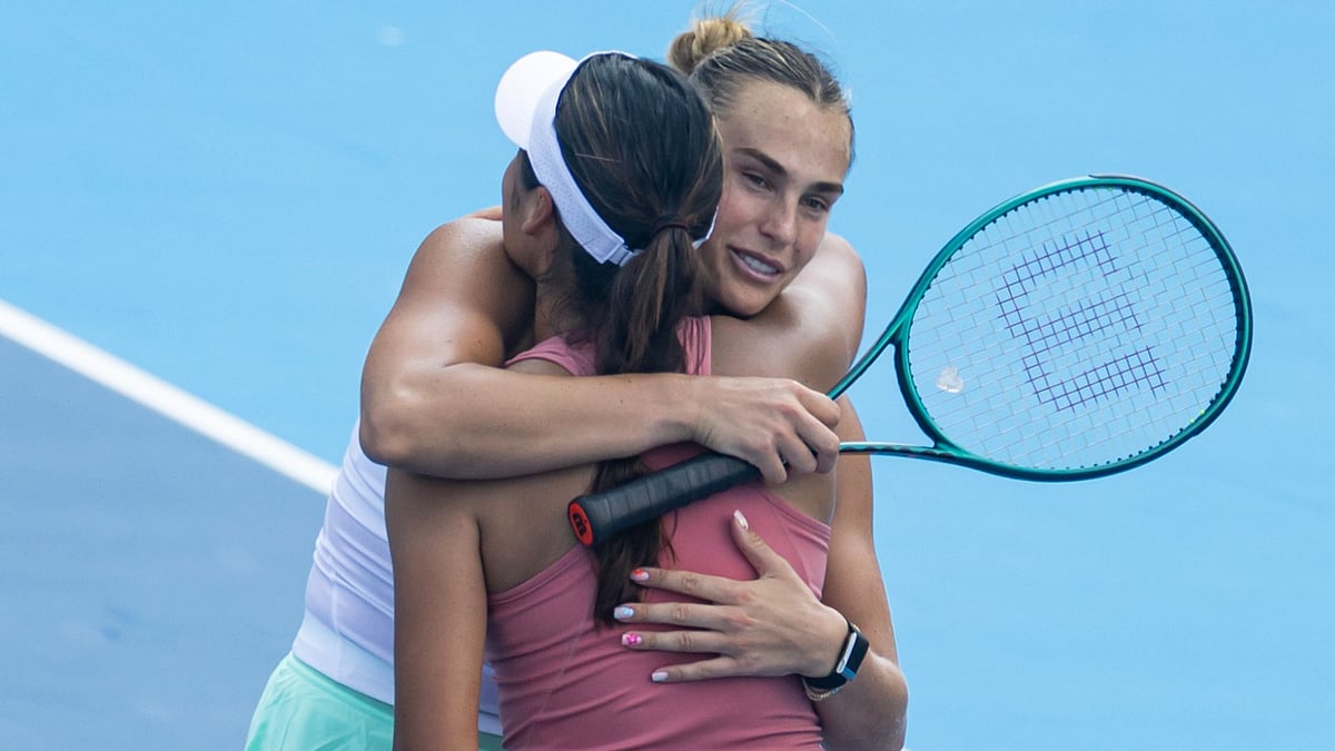 Sabalenka and Raducanu share an embrace after their battle