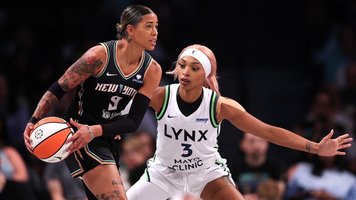 Natasha Cloud #9 of the New York Liberty possesses the ball while being guarded by DiJonai Carrington #3 of the Minnesota Lynx at Barclays Center on August 10, 2025 in the Brooklyn borough of New York City.