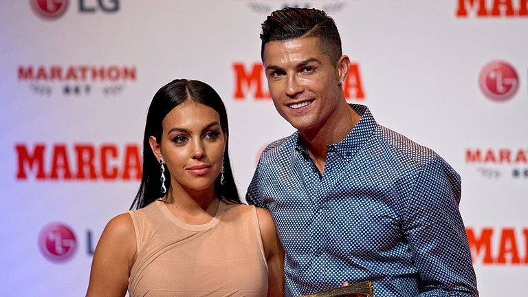 File photo of Cristiano Ronaldo posing with his partner, model Georgina Rodriguez. - AP