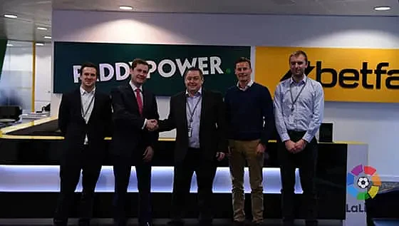 Paddy power and Betfair handshake