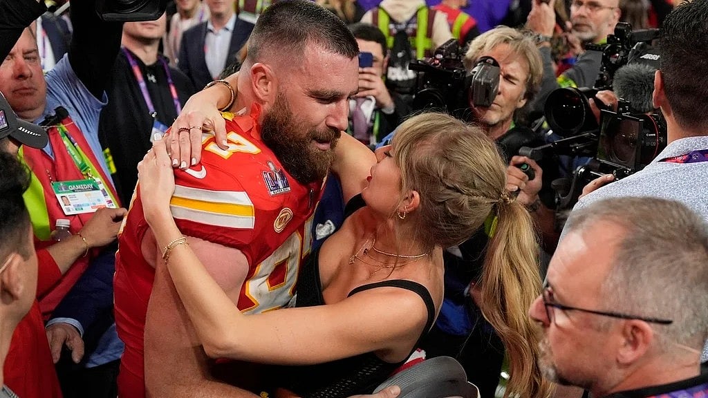 John Locher/ AP : Taylor Swift and Travis Kelce
