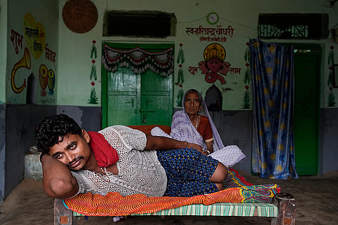 Shalok Chaudhary, Dom community member, with his grandmother in Varanasi