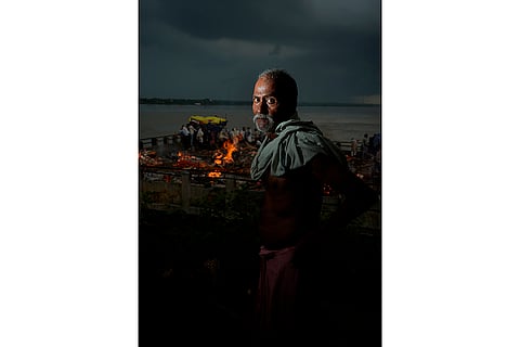 Raj Kumar Chaudhary Dom community at Manikarnika Ghat in Varanasi 