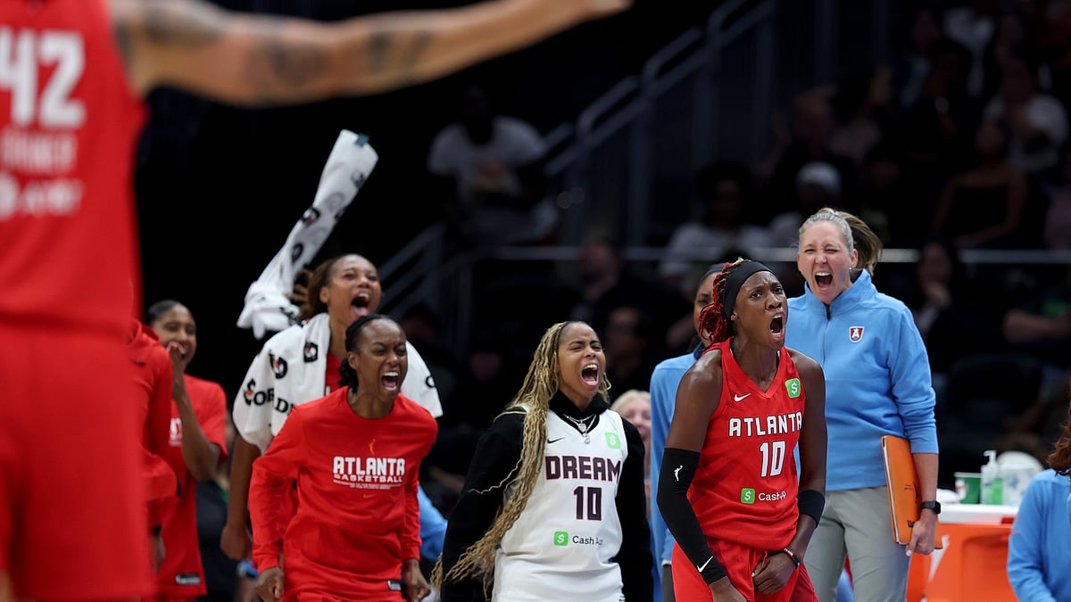 Rhyne Howard #10 of the Atlanta Dream reacts after her three point basket against the Seattle Storm at Climate Pledge Arena on August 13, 2025 in Seattle, Washington.