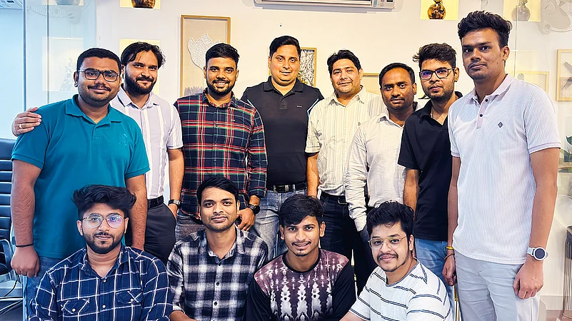 NextBigBox Team members standing for a group picture