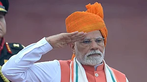 PTI : In this screengrab via PMO website, Prime Minister Narendra Modi stands for the national anthem after hoisting the national flag during the 79th Independence Day celebration at the Red Fort.