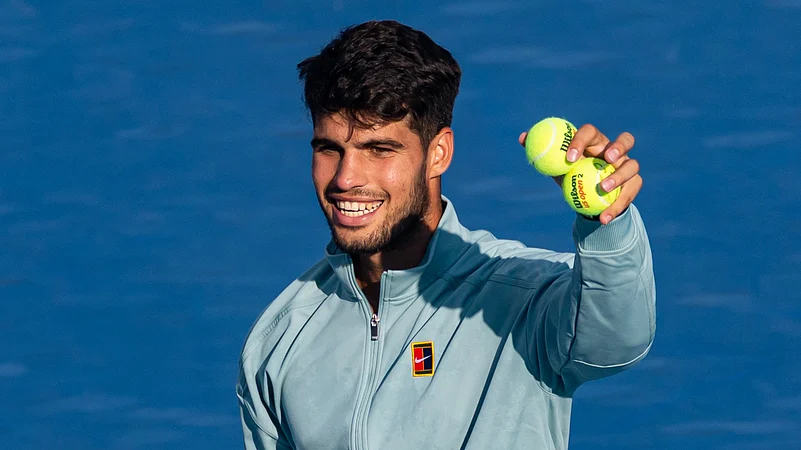 Carlos Alcaraz smiles after his victory over Andrey Rublev