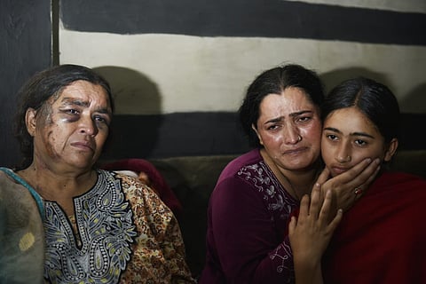 Families wait anxiously for news of the missing.