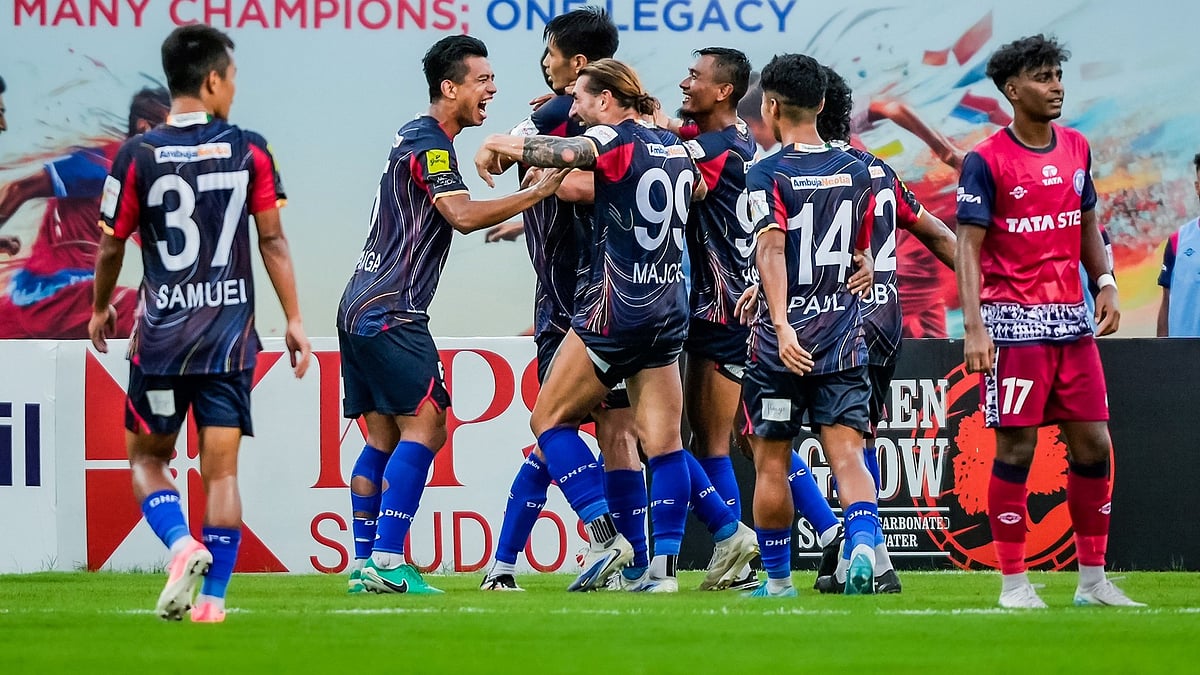X/thedurandcup : Diamond Harbour FC players celebrate a goal.