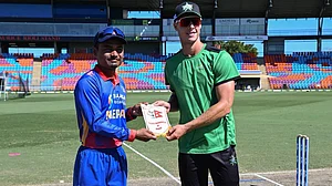 | Photo: X/CricketNep : Nepal vs Melbourne Stars Academy, Top End T20 Series 2025: Nepal's Rohit Kumar Paudel and Melbourne Star Academy's Campbell Kallaway ahead of the match.