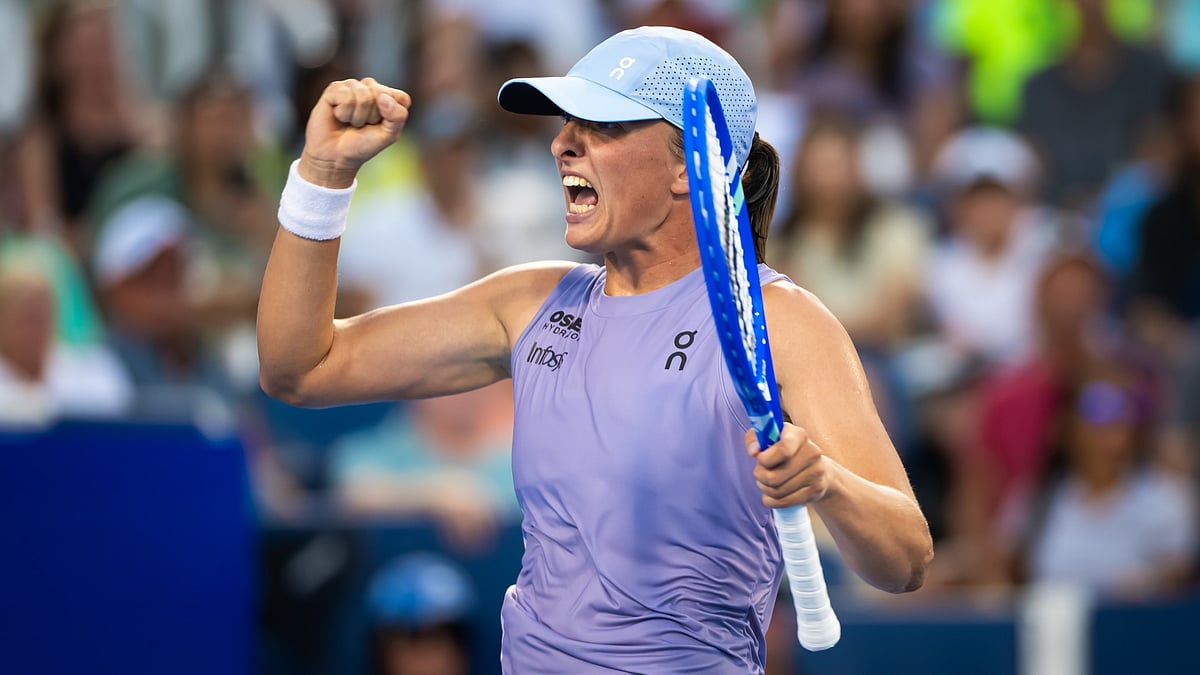 Iga Swiatek celebrates her triumph