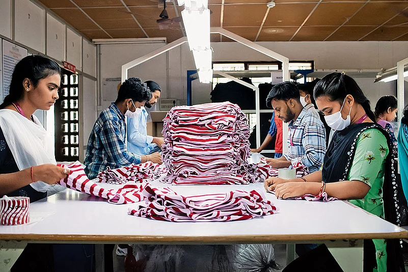 Employees at a textile unit in Pooluvanpatti, Tiruppur